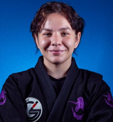 Charlie Voss (they/she) - Assistant Kids Jiu Jitsu Coach photo